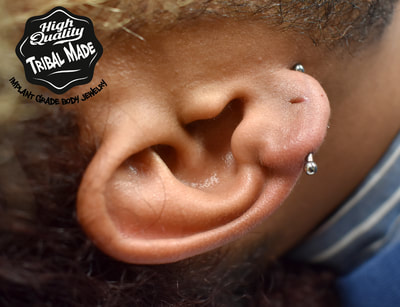 Our 14g Titanium Barbells are multi purpose! Great for both industrials and transverse lobes, as shown here